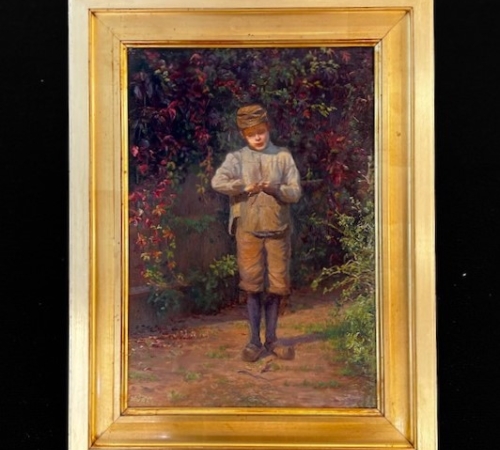 Emilie Mundt: En dreng snitter en kæp i blomstrende have. Sign. E. M. 94. Olie på lærred. 39×28. -  solgt